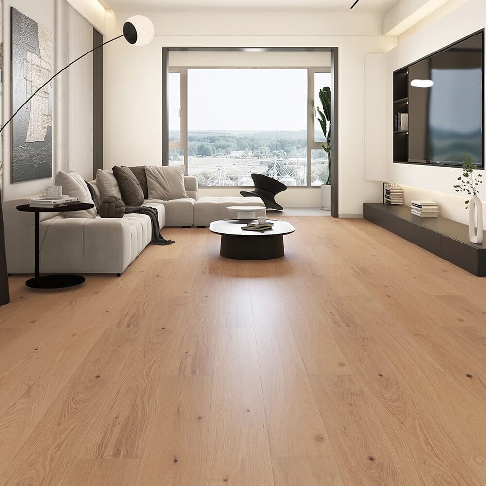 Wide-plank hardwood across an open-concept main floor Wide-plank hardwood flooring in an open living room and kitchen